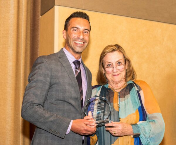 Dr. Cohen receives an Excellence in Medicine Award from AMA President Dr. Nancy Mueller