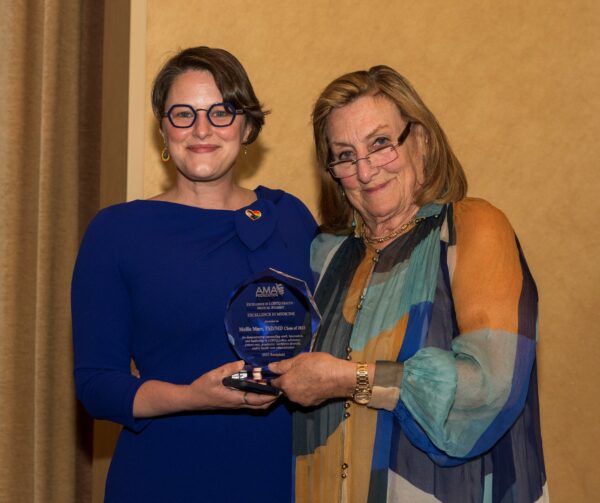 Dr. Marr receives an Excellence in Medicine Award from AMAF Dr. Nancy Mueller